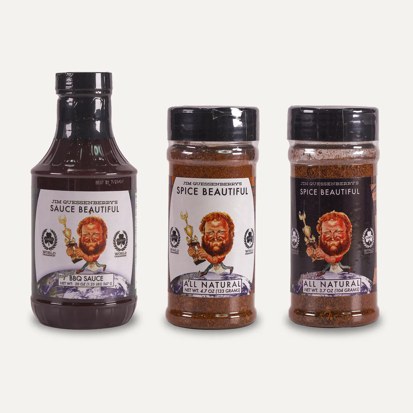 Sauce Beautiful Original 20 oz bottle, Spice Beautiful Original rub shaker and Spice Beautiful Hickory rub shaker, side by side